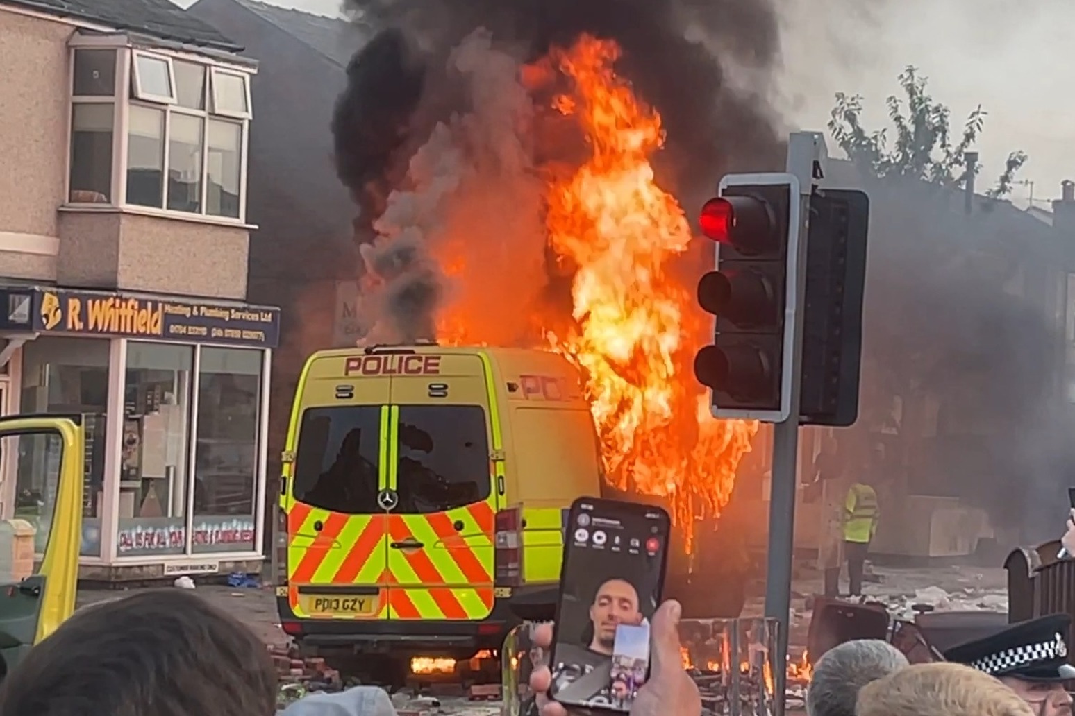 Violent clashes between protesters and police in Southport following stabbings 