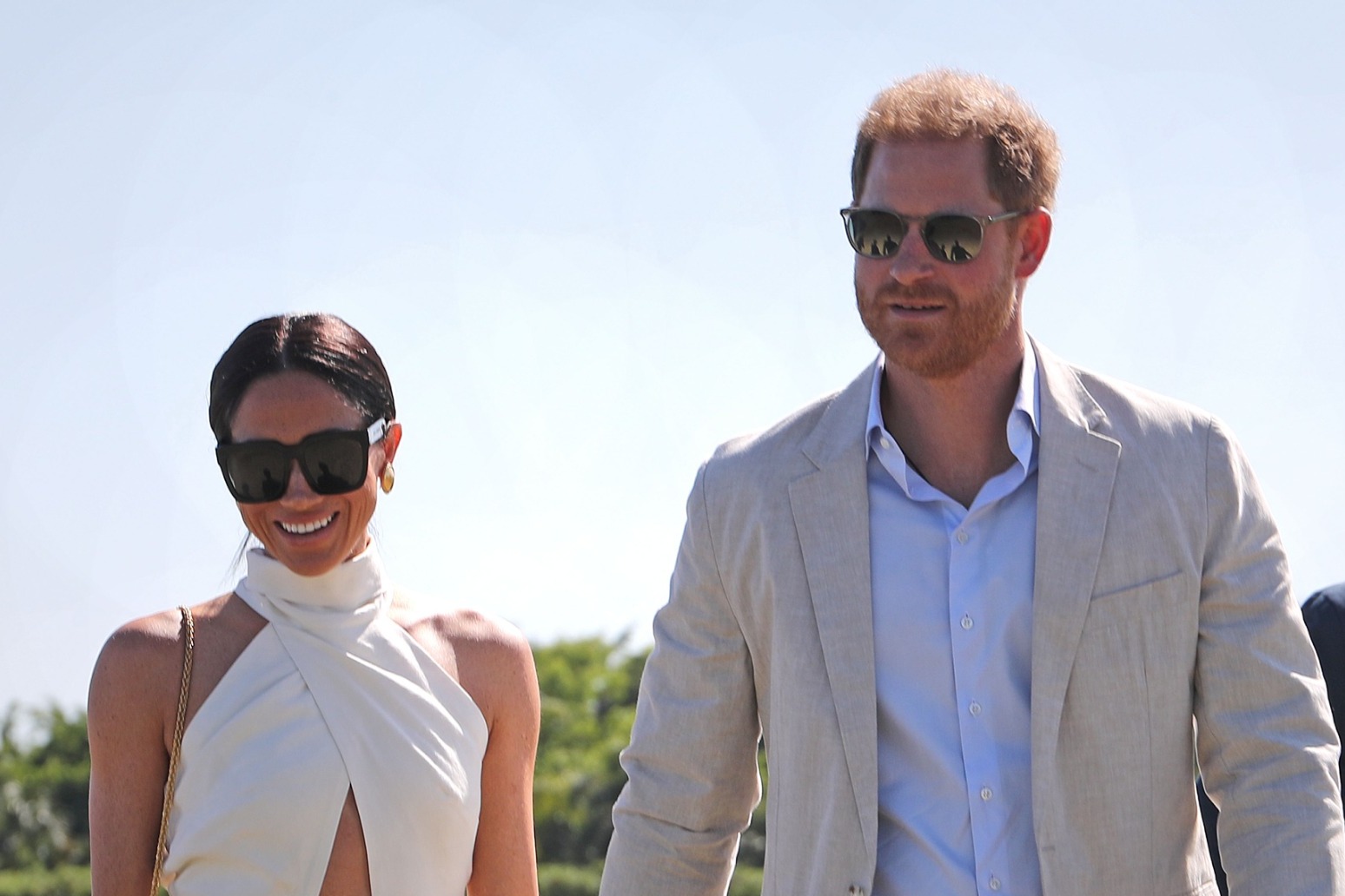 Meghan wears ‘big smile’ during visit to Colombian music school with Harry 