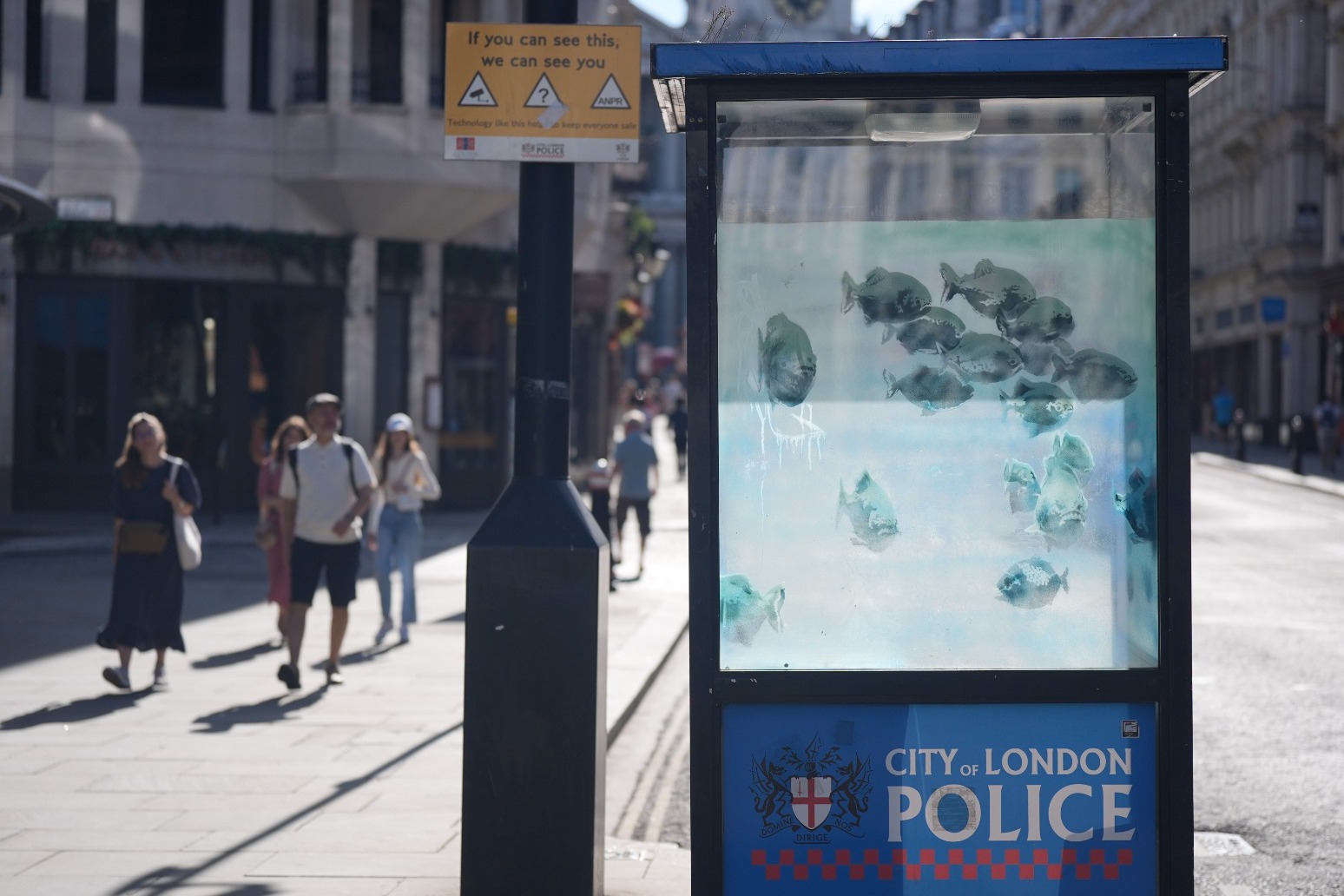 New swimming fish design on London police box thought to be latest Banksy 