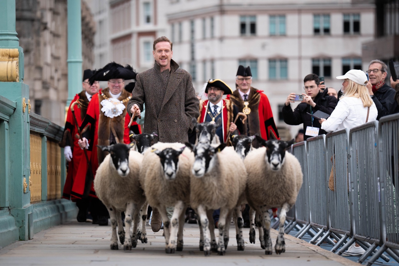 Hollywood’s Damian Lewis drives sheep over the Thames in ‘eccentric’ tradition 